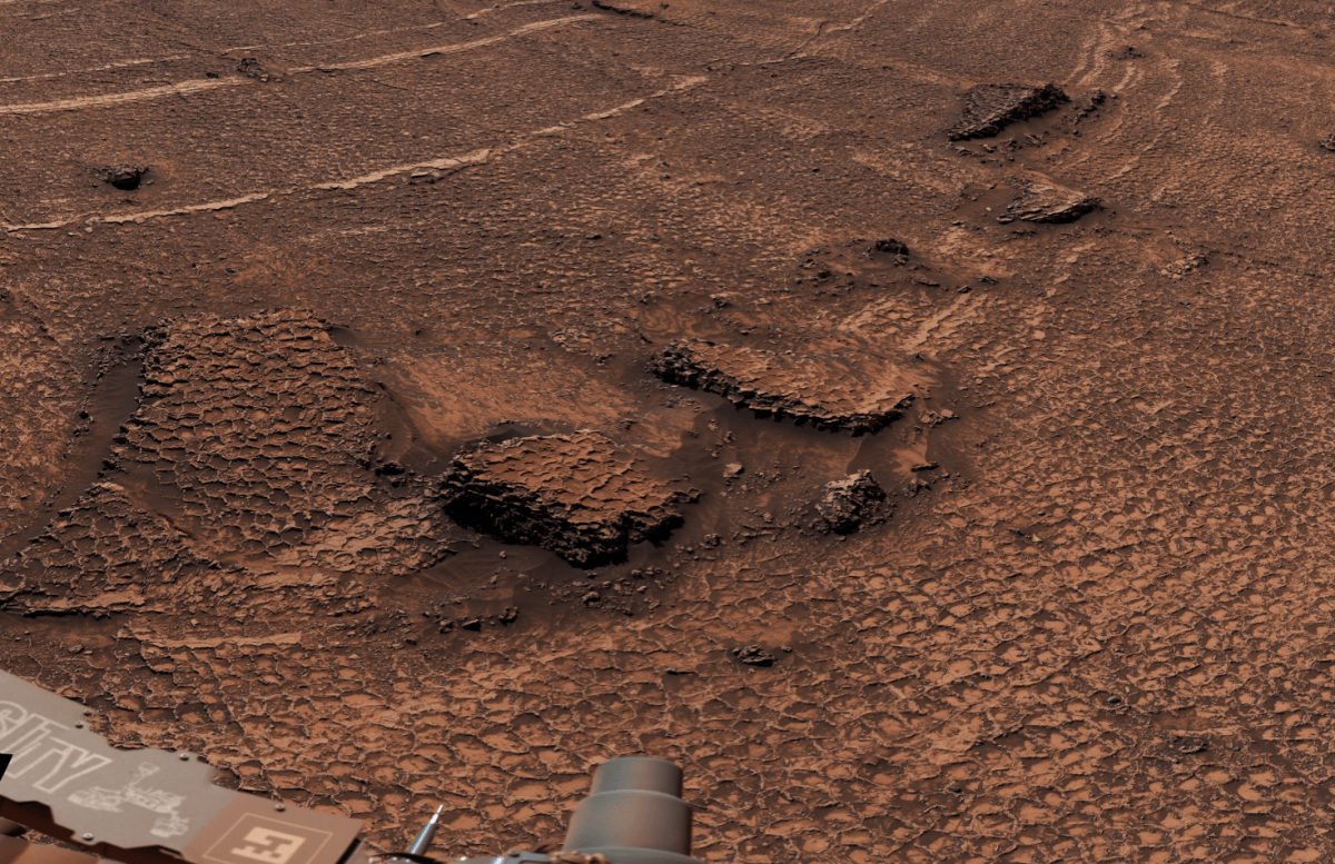 Close-up of honeycomb-like polygonal fractures on the Martian surface